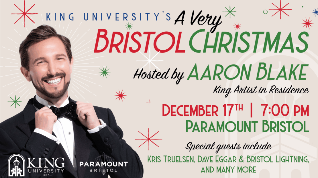 A smiling man in a tuxedo adjusts his bow tie. Text reads: “King University’s A Very Bristol Christmas hosted by Aaron Blake. December 17th, 7:00 PM, Paramount Bristol. Special guests include Kris Truelson and more.”.